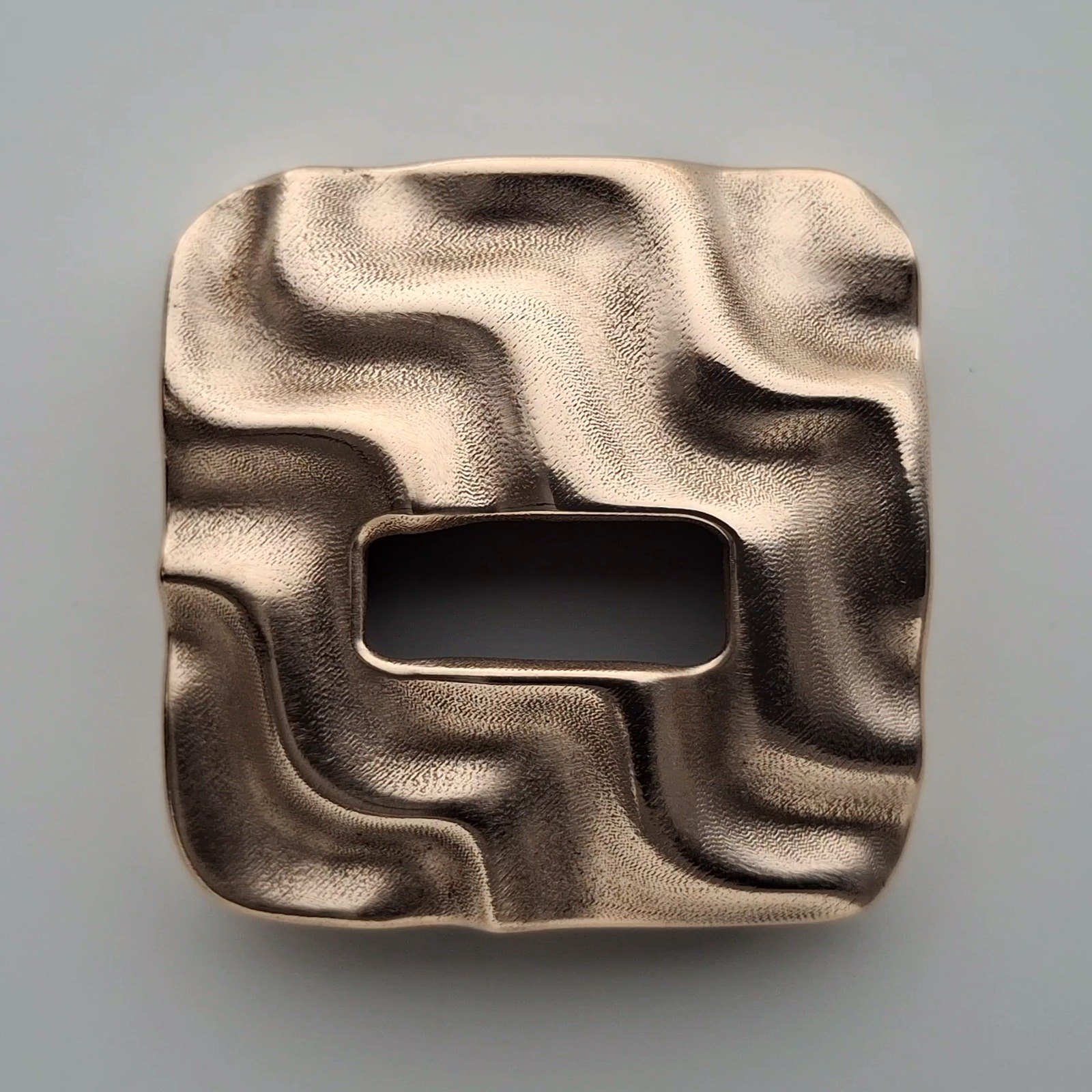 The Askja case in bare bronze, seen from above